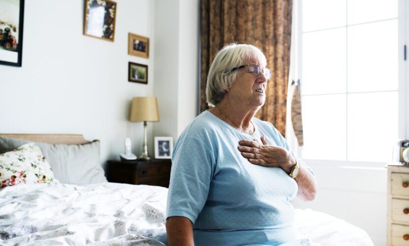 Senior woman having a heart problem